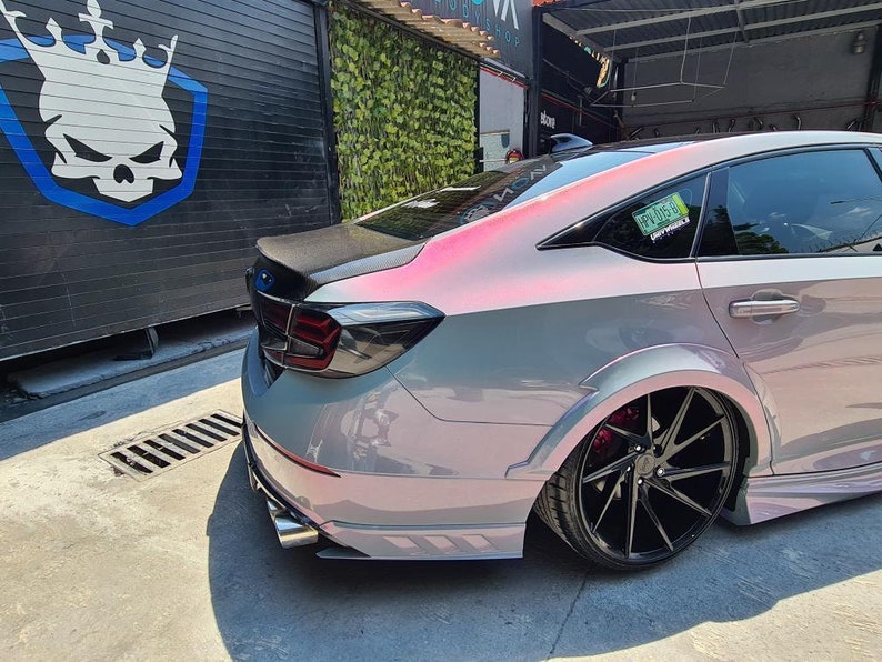 BMW in a crazy colorshift called Ceres Megashift. Such nice a nice purple to magenta mica pigment. Used in car paint liquid car wrap
