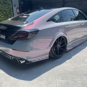 BMW in a crazy colorshift called Ceres Megashift. Such nice a nice purple to magenta mica pigment. Used in car paint liquid car wrap
