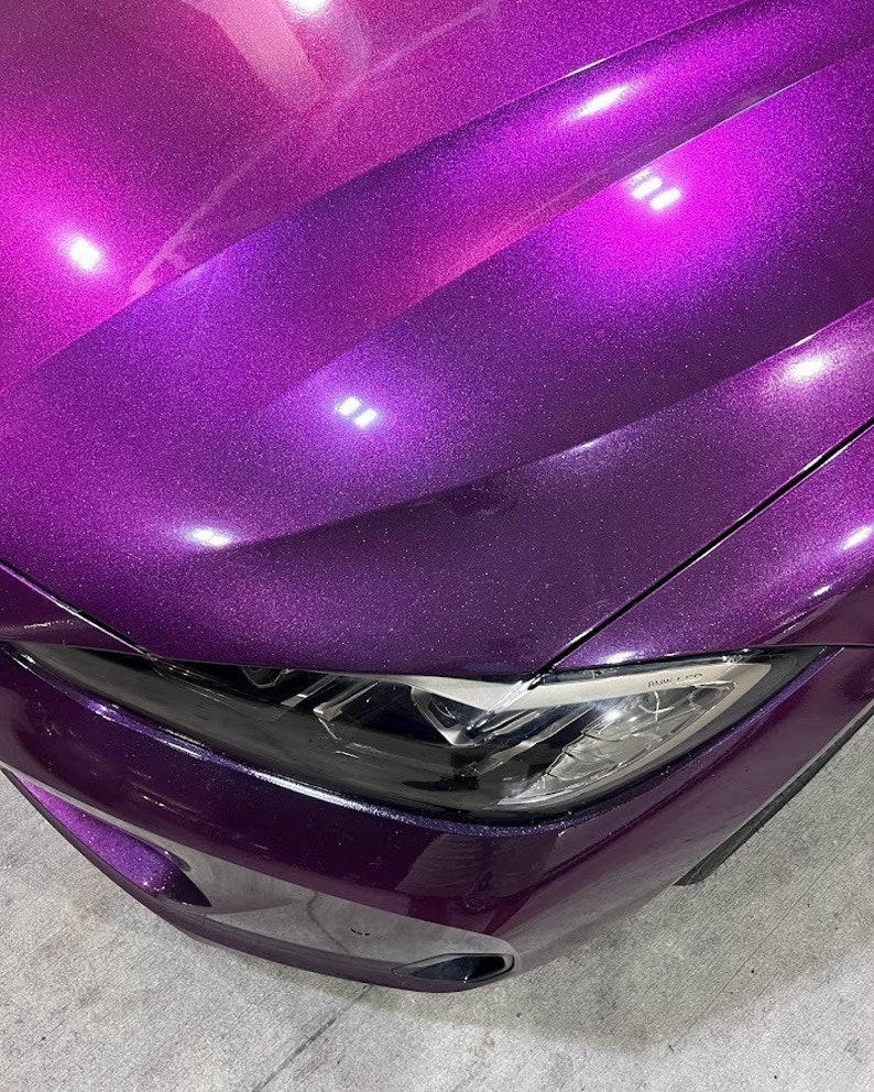BMW in a crazy colorshift called Ceres Megashift. Such nice a nice purple to magenta mica pigment. Used in car paint liquid car wrap