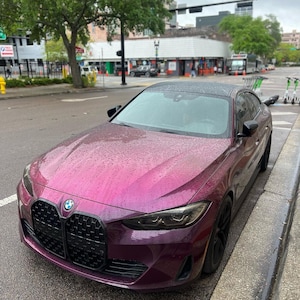 BMW in a crazy colorshift called Ceres Megashift. Such nice a nice purple to magenta mica pigment. Used in car paint liquid car wrap