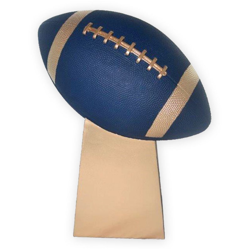 Sculpted football cremation urn with football atop a base that holds the cremains.  Offered in colors of your choosing.