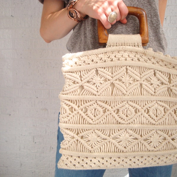 vintage 70s handmade cream macrame clutch with wooden top handle