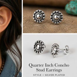 May include: A pair of silver-plated stud earrings featuring a circular concho design with a central dome surrounded by small beads. The text on the image reads: Quarter Inch Concho Stud Earrings, STYLE SILVER PLATED, Timeless Western Charm, Everyday Wear.
