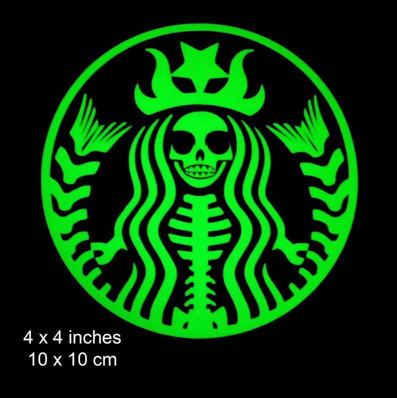 May include: Green glow-in-the-dark sticker of a skeleton mermaid with a crown, resembling the Starbucks logo. The sticker is 4 inches by 4 inches.