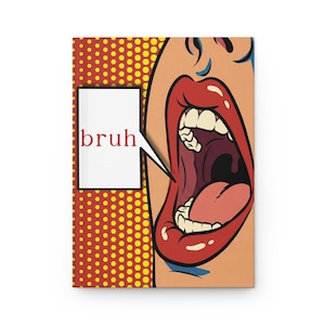 May include: A hardcover journal featuring a pop art illustration of an open mouth with red lips and white teeth. A speech bubble on the left side contains the text bruh. The background consists of a yellow and red pattern of small dots.