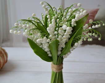 bouquet of lilies of the valley pink and white