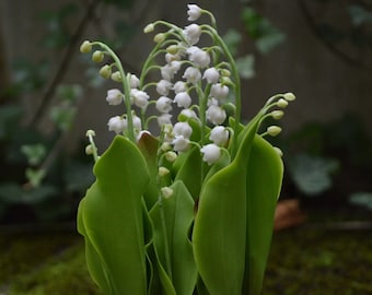 table arrangement of lily of the valley flowers, made of floral polymer clay (cold porcelain)