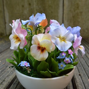 Composition of spring flowers. Pansies Floristic polymer clay (cold porcelain)