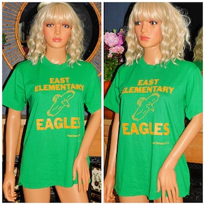 Maglietta vintage anni &#39;80 morbida con punto singolo, verde atletico, per la scuola elementare, EAGLES, grafica unisex anni &#39;80, taglia M, 50/50