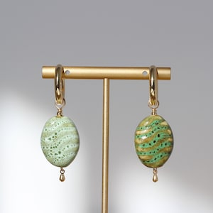 Oval green ceramic earrings