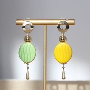 Asymmetrical yellow and green ceramic earrings