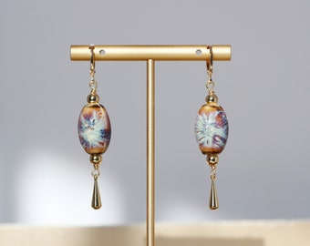 Painted porcelain earrings. 14k gold plated.