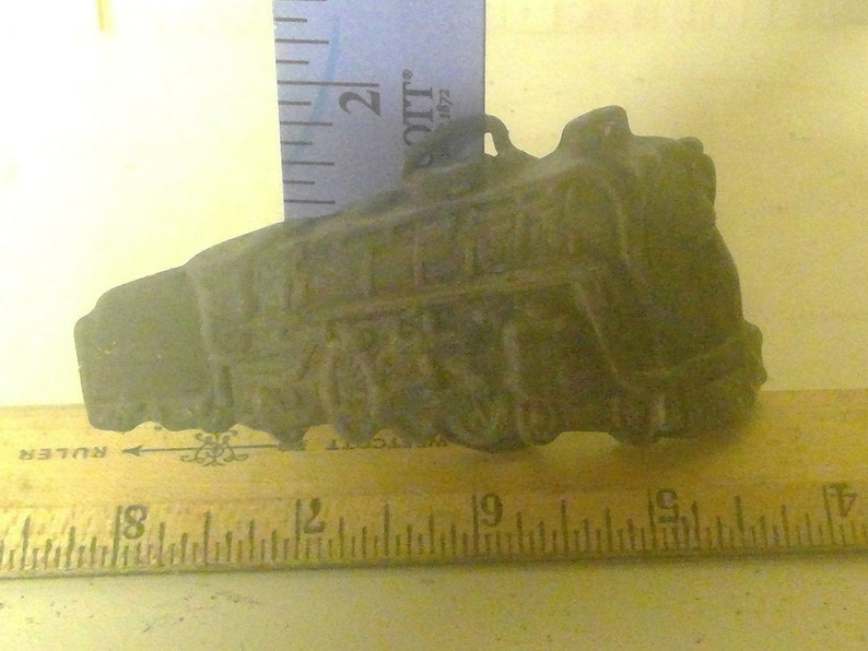 1970s train belt buckle