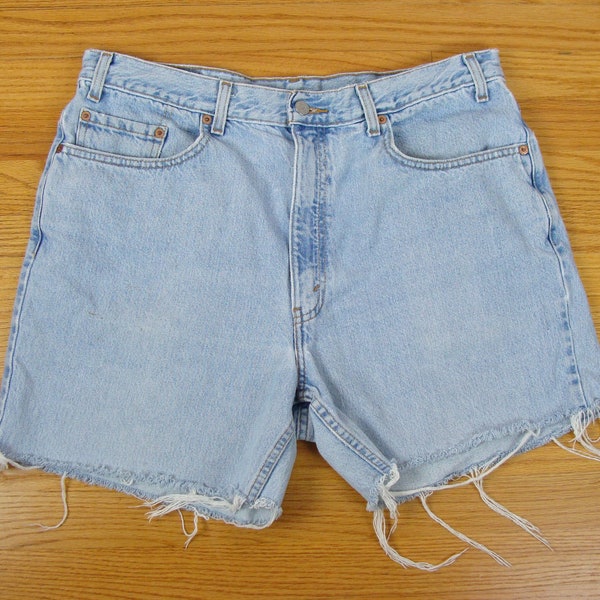 Vintage Levis 550 Cut Off Jean Shorts 90s Light Wash Distressed Denim Longline Relaxed Fit Raw Edge Frayed Waist 38 Mom Jeans 1990s