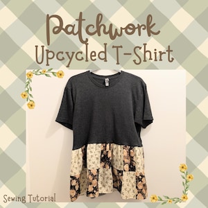 May include: A dark gray, short-sleeved t-shirt with a patchwork, floral-patterned bottom. The text "Patchwork Upcycled T-Shirt" is displayed above the shirt. The words "Sewing Tutorial" are at the bottom.