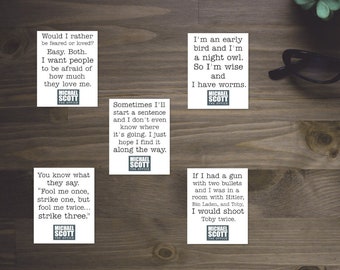 May include: Four white rectangular stickers featuring black text quotes from Michael Scott of The Office. The quotes include: Would I rather be feared or loved? Easy. Both. I'm an early bird and I'm a night owl. Sometimes I'll start a sentence. Fool me once. If I had a gun.
