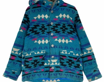 May include: A teal blue hooded jacket with a geometric pattern in shades of pink, white, black, and blue. The jacket has a fleece lining and a button closure.