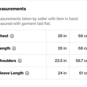 May include: Image showing garment measurements. Chest: 26 inches (66 cm), Length: 26 inches (66 cm), Shoulders: 23.5 inches (59.7 cm), Sleeve Length: 24 inches (61 cm). Measurements taken with the item laid flat.