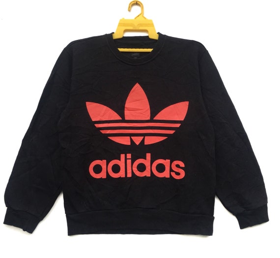 adidas sweatshirt with logo on sleeves