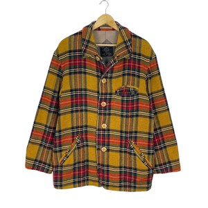 May include: A yellow, red and black plaid button-up jacket with a single chest pocket and two lower pockets.