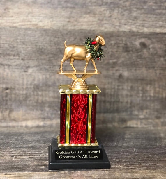 13 G.O.A.T. Trophy with Custom Engraving on Personalized Plate