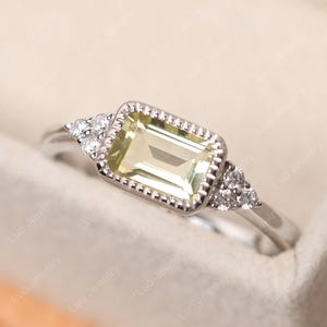 Delicate emerald cut lemon quartz anniversary ring, sterling silver, bezel setting east west ring