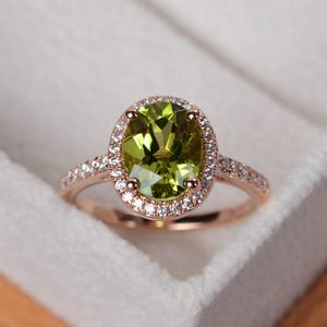 Peridot ring, rose gold, halo ring gold, engagement ring rose gold, oval cut, August birthstone ring