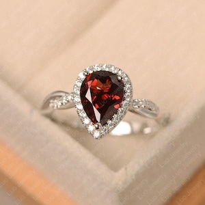 Pear shape garnet halo wedding ring, sterling silver twist ring, January birthstone