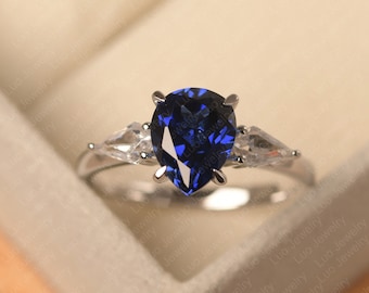 Tear drop wedding ring, dark blue sapphire three stone ring, sterling silver, September birthstone