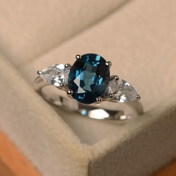 London blue topaz ring, oval cut, three stone ring, sterling silver
