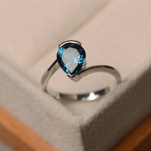 London blue topaz ring, pear cut blue gemstone, sterling silver finished with rhodium, engagement ring, solitaire ring