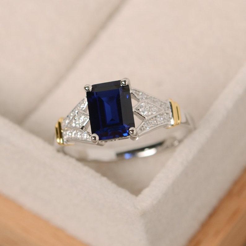 yellow gold claw ring sapphire emerald cut sapphire gemstone ring Blue sapphire ring
