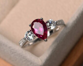July birthstone ring, lab red ruby ring, engagement ring, pear cut ruby, gemstone ring, sterling silver ring, three stones ring