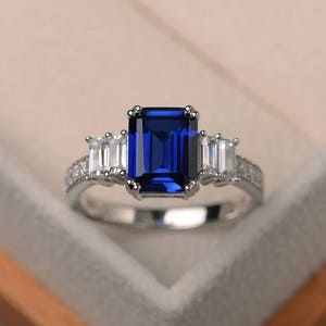 Engagement ring, blue sapphire ring, September birthstone, emerald cut gemstone, sterling silver ring