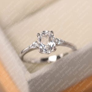 Natural white topaz ring, oval cut white crystal, sterling silver engagement ring for women