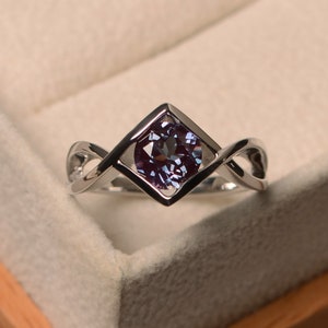 Infinity band ring, round shaped alexandrite engagement ring, June birthstone, color changing gemstone, Solitaire ring