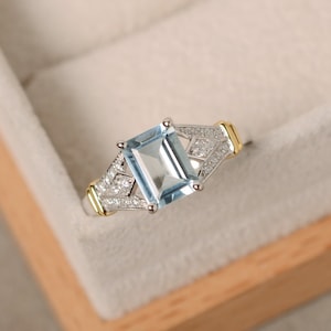 Aquamarine ring, yellow gold, sterling silver, emerald cut gemstone, claw ring