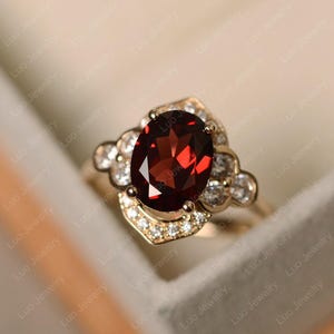 Garnet ring, oval cut, January birthstone ring, yellow gold, engagement ring