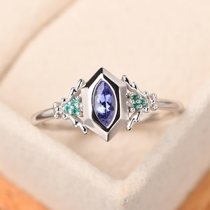 Unique tanzanite and emerald ring,custom engagement ring, marquise cut,December May birthstone ring