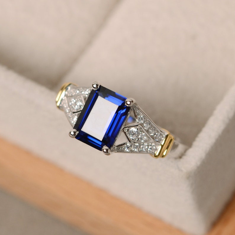 yellow gold claw ring sapphire emerald cut sapphire gemstone ring Blue sapphire ring