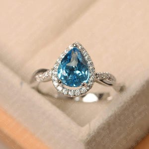 Swiss blue topaz ring, pear cut blue stone ring, white gold halo anniversary ring