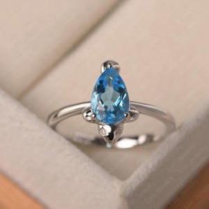 Delicate engagement ring, Swiss blue topaz fish ring, water drop shaped, November birthstone