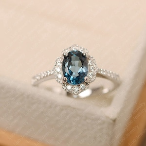 London blue topaz ring, oval cut, halo ring, sterling silver, engagement ring for women