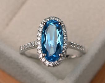 Swiss blue topaz ring, wedding ring, oval cut gems, halo ring, gemstone ring, sterling silver ring