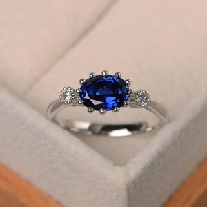 Engagement ring, lab blue sapphire ring, blue gemstone, oval cut gemstone, September birthstone