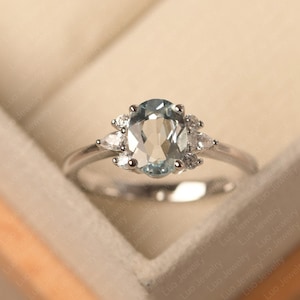 March birthstone aquamarine ring, delicate engagement silver ring, oval cut, light blue gemstone