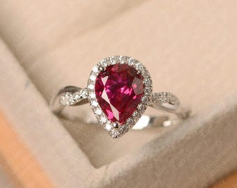 Red ruby ring, sterling silver halo wedding ring, pear cut July birthstone ring