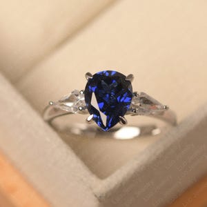 Tear drop wedding ring, dark blue sapphire three stone ring, sterling silver, September birthstone