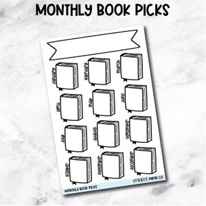 May include: A white sticker sheet with the text "MONTHLY BOOK PICKS" at the top and bottom. The sheet features a banner and twelve book illustrations, each labeled with a month from January to December. The sticker is from Cricket Paper Co.