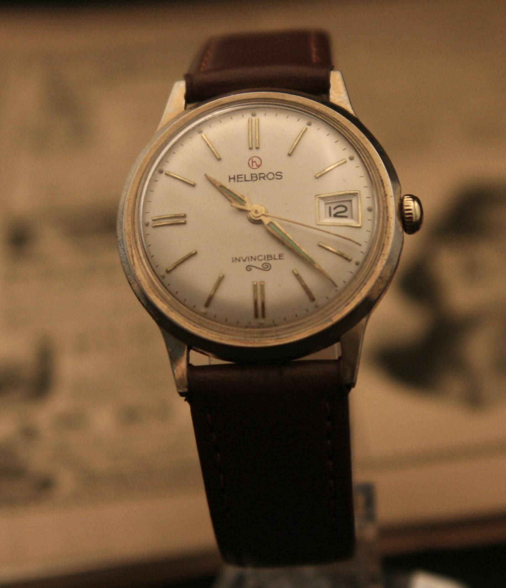 Men s vintage 1960 s 17 jewel Helbros Invinceable manual wind gold dress wristwatch running well